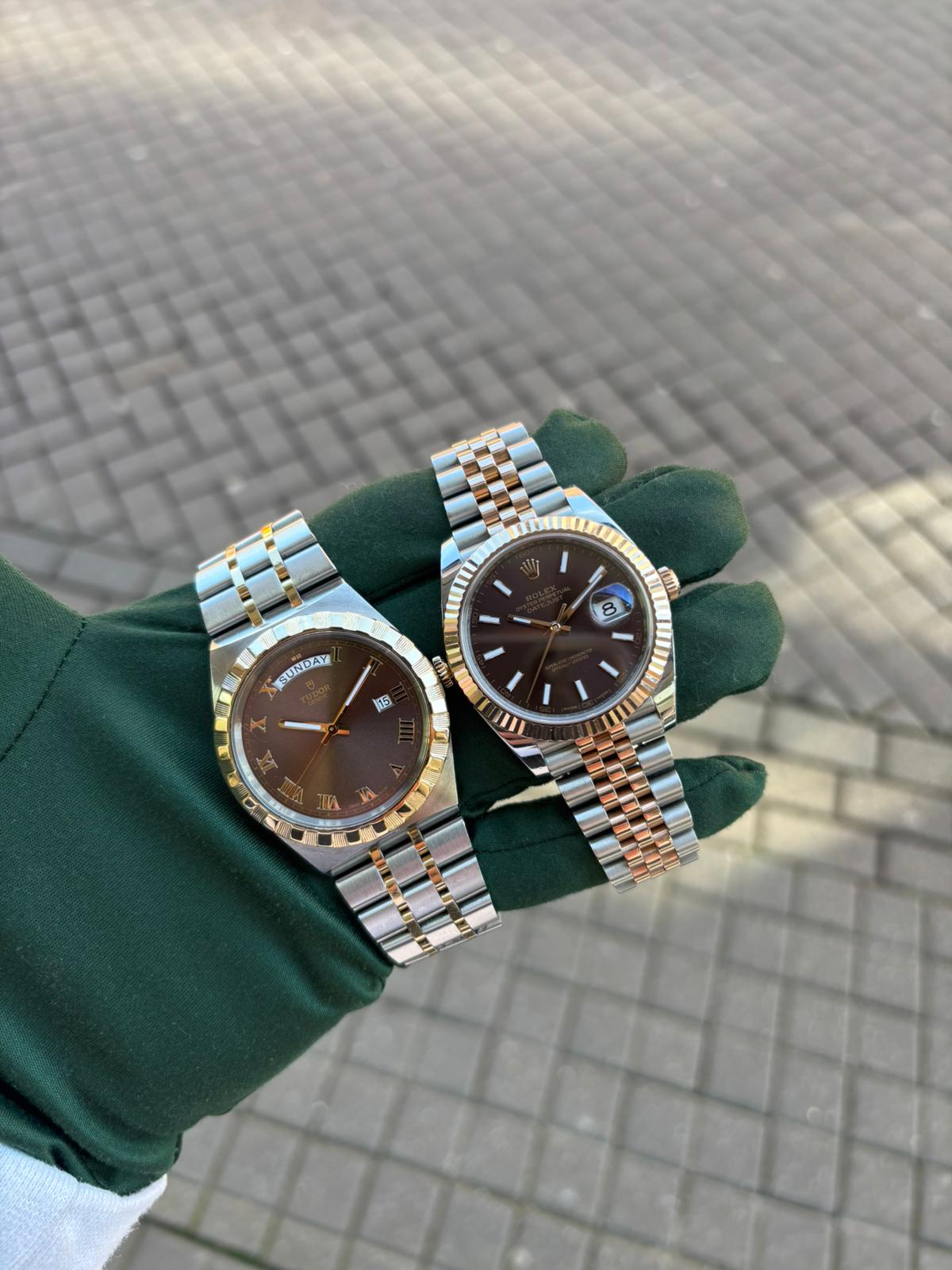 Rolex Datejust on leather strap in hand